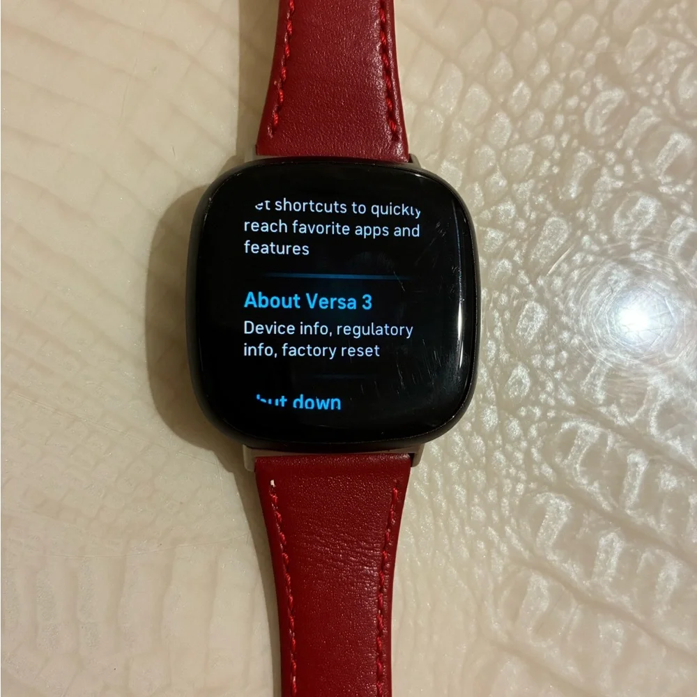 Fitbit Smartwatch with Red Strap